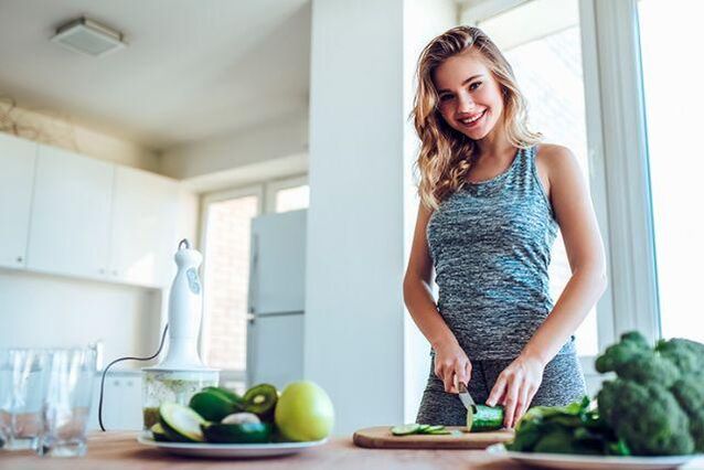 Girl prepares food according to the first principle of the gastritis diet